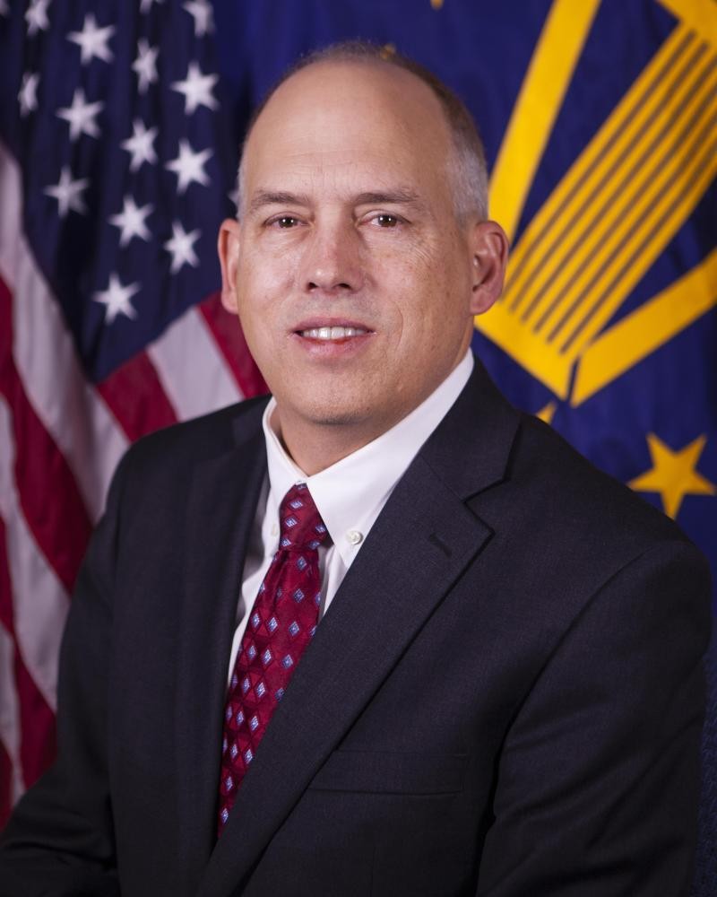 Dr. Brett Baker (former Federal Inspector General)